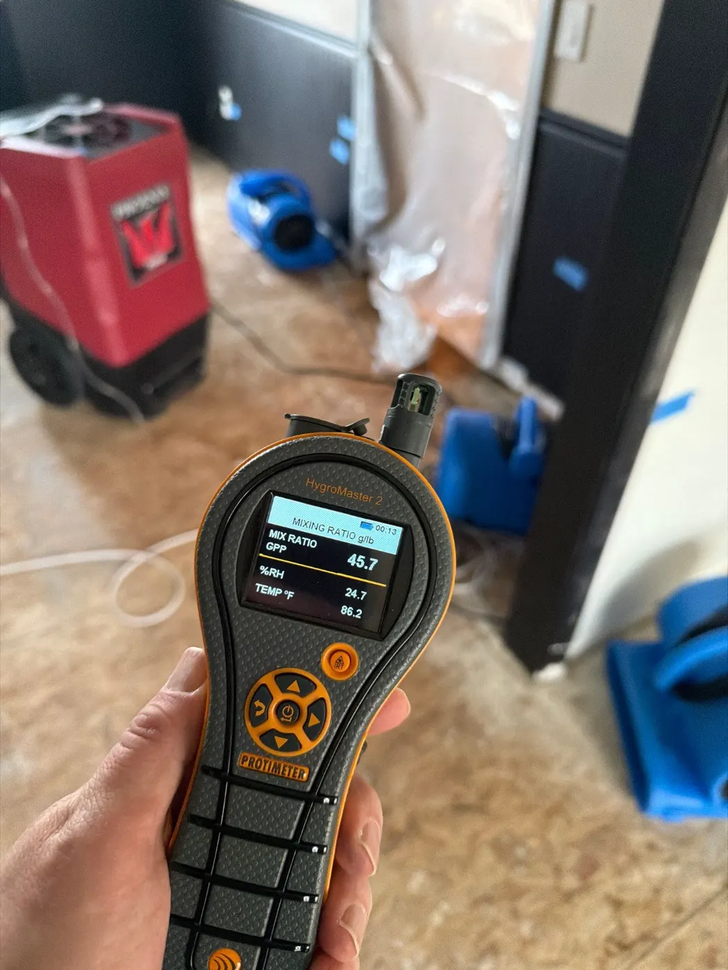 Moisture meter reading on drywall in Lapel water loss